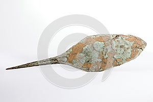 Ancient arrowhead on isolated background.