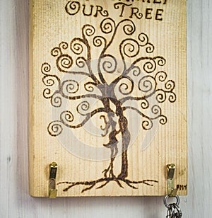 The ancient art of pyrography, wood and fire, tree of life, hang keys and objects