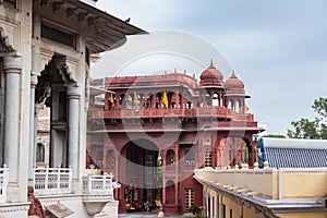 ancient artistic holy jain trample entrance with cloudy sky at morning