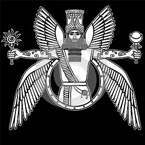 Ancient Assyrian winged deity. photo