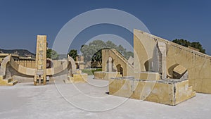 Ancient astronomical measuring instruments made of sandstone are located at the Jantar Mantar Observatory.
