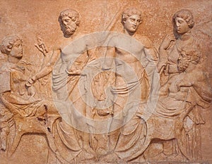 Ancient bas-relief on funerary stele from Kerameikos in Athens, Greece photo