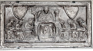 Ancient Bas-Relief: Monk, Abbot, and Disciples photo