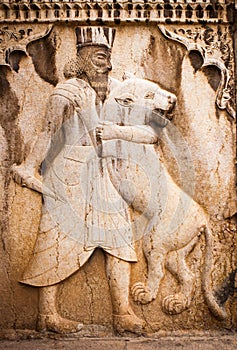 Ancient bas-relief in Persepolis, Iran. Man is.