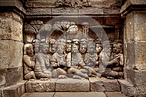 Ancient bas-reliefs on the walls of the Borobudur temple. Indonesia. photo