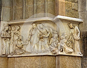 Ancient bas-reliefs on the Windows and walls of historical buildings