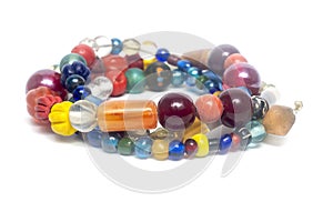 Ancient beads multicolored Thailand isolated on white background.