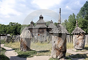 Ancient beehives nearby wooden church