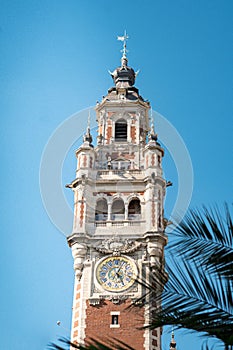 Ancient Beffroi de Lille tower against the blue sky