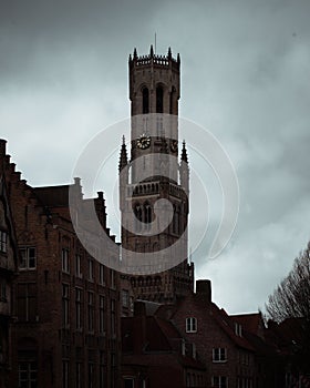 Ancient Belfry of Bruges in Belgium in a cloudy day