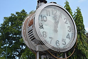 ancient big clock in the middle of the city