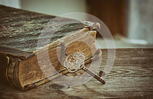 Ancient book and old jewelry key