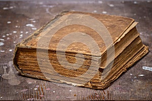 Ancient book on old wooden table