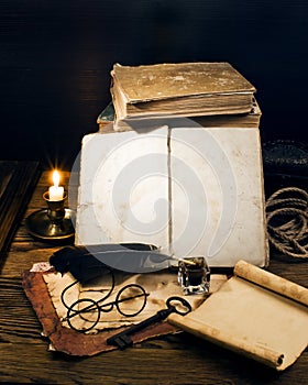Ancient books on the old paper background