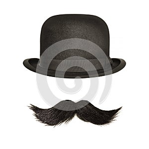 Ancient bowler hat with black curly moustache isolated on white