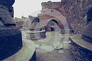 Ancient bread ovens in the city of Pompeii. Italy