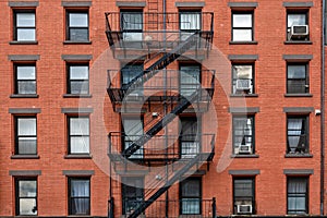 Ancient brick buildings with fire stairs  in New York City