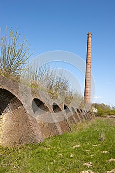 Ancient brick factory with brick kiln holes and ch