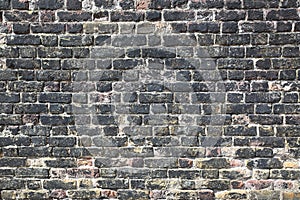 Ancient brick wall in Tower of London castle, London - UK