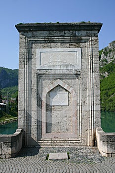 Ancient bridge on drina river photo