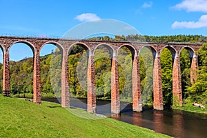 Ancient bridge in a river landscape