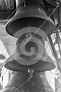 Ancient bronze bells on the bell tower of an Orthodox church.