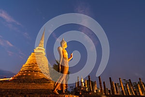 Ancient Buddha image with pagoda in ruin Buddhist temple