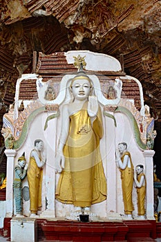 Ancient Buddha statue inside sacred Kaw Gun Cave in Kayin State