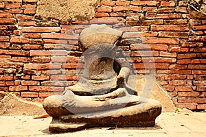 Ancient buddha statue at Mahathat temple, historic site in Ayuttaya province,Thailand. photo
