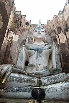 ancient buddha statue (Phra Achana) in Wat Si Chum (Buddhist temple). Sukhothai Historical Park, Sukhothai, Thailand