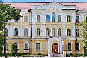 The ancient building of the educational building of the Far Eastern Agrarian University on a sunny summer day. Facade of