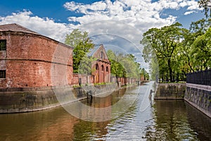 Ancient building in Kronstadt on the banks of the Bypass channel, Russia