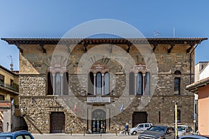 The ancient building of the Public Assistance L`Avvenire in the historical center of Prato, Italy photo