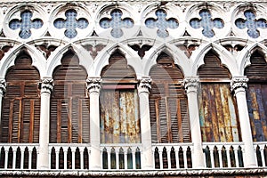 Ancient building with worn facade in Venice, Italy