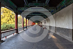 Ancient buildings with red wall and corridor in the Park of Temple of Heaven, Beijing, China