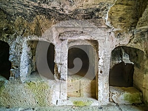 Ancient burial niches in the chamber of the necropolis. photo