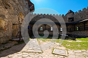 ancient cannon in the inner courtyard of the castle