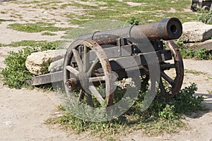 Ancient cannon on wheels photo