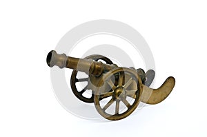 Ancient cannon on wheels on white