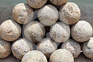 Ancient Canon balls made of granite rock