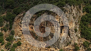 Ancient Carian tombs carved in rocks in Dalyan, Turkey. Aerial view of antique architecture