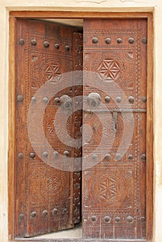 Ancient carved door with bolts, Riffa fort Bahrain