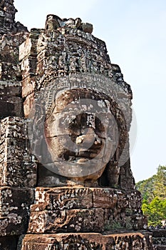 Ancient carved face in Angkor Wat