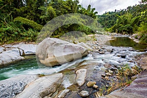 Ancient carved figures on stones in Jayuya Puerto Rico photo