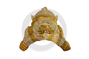 Ancient carved wood Rahu isolated on white background.