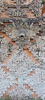 Ancient carving at entrance gate of Pura Desa Buleleng temple