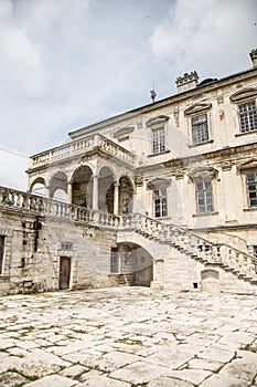 Ancient castle and courtyard in front