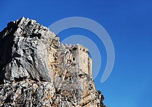 Ancient castle on a rock, space for text