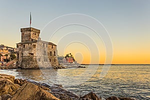 The ancient castle on the sea at sunset, Rapallo, Genoa Genova, Italy