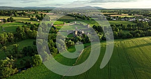 An ancient castle set against a backdrop of green dales in Ireland Kells Priory